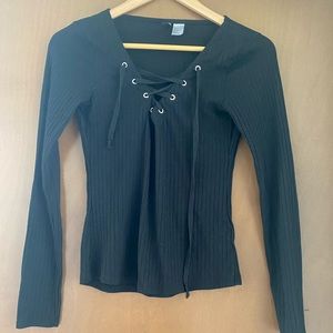 Black long sleeve grommet detail top